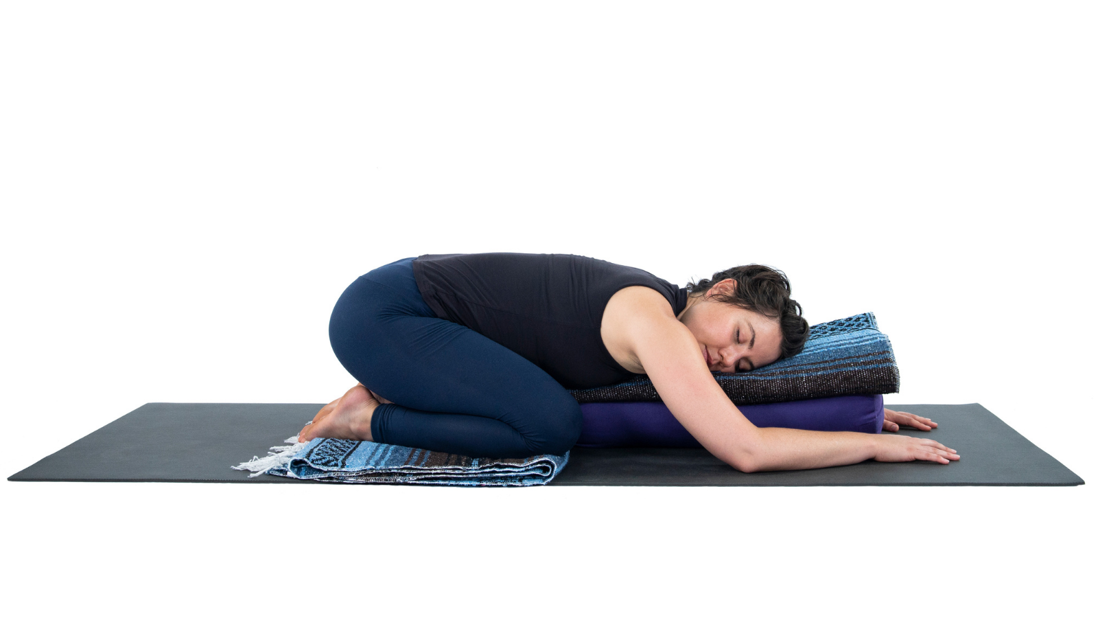 A person practicing Restorative Child's Pose in a sequence for lower back pain